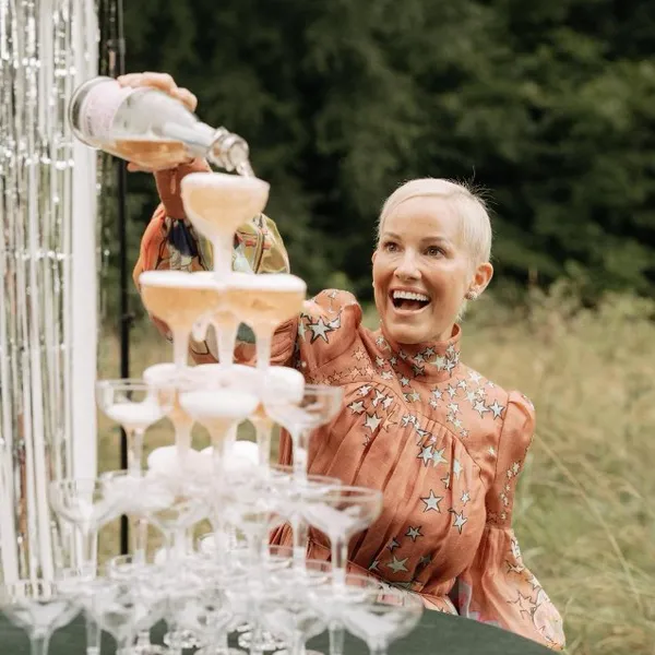 Ashley pouring a champagne tower